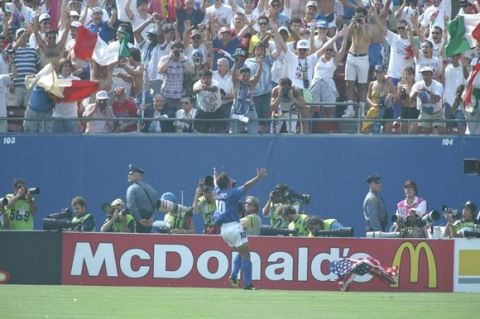 13 Jul 1994:  Robert Baggio of Italy celebrates with the crowd after scoring during the World Cup semi-final against Bulgaria at the Giants Stadium in New York, USA. Italy won the match 2-1. \ Mandatory Credit: Rick  Stewart/Allsport