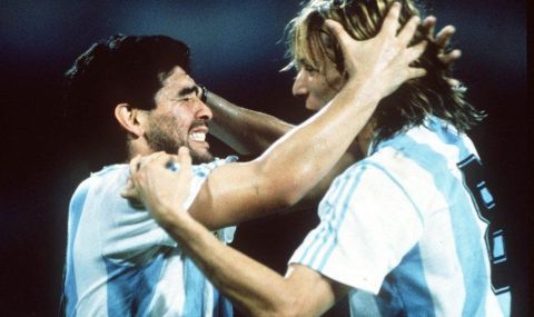 1990 World Cup Finals, Naples, Italy, 18th June, 1990, Argentina 1 v Romania 1, Argentina's Claudio Caniggia celebrates with an emotional Diego Maradona  (Photo by Bob Thomas/Getty Images)