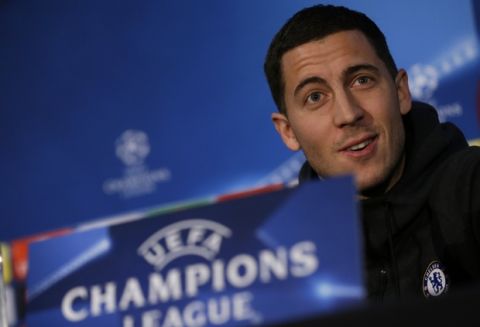 Chelsea's Eden Hazard listens to journalists' questions during a news conference at Stamford Bridge stadium in London, Monday, Feb. 19, 2018. FC Barcelona will play Chelsea in a Champions League round of sixteen first leg soccer match on Tuesday. (AP Photo/Alastair Grant)