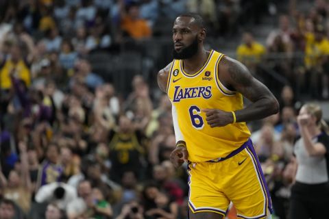 Los Angeles Lakers forward LeBron James (6) plays against the Phoenix Suns during a preseason NBA basketball game Wednesday, Oct. 5, 2022, in Las Vegas. (AP Photo/John Locher)