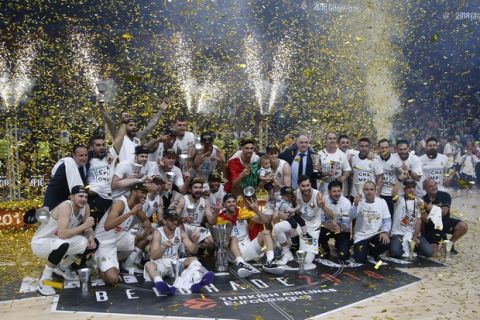 Real Madrid players celebrate as they win the Final Four Euroleague final basketball match between Real Madrid and Fenerbahce Istanbul in Belgrade, Serbia, Sunday, May 20, 2018. (AP Photo/Darko Vojinovic)