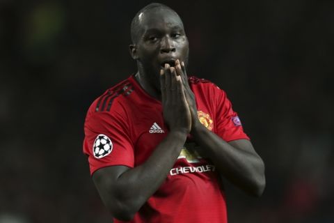 ManU forward Romelu Lukaku reacts during the Champions League group H soccer match between Manchester United and Valencia at Old Trafford Stadium in Manchester, England, Tuesday Oct. 2, 2018. (AP Photo/Jon Super)