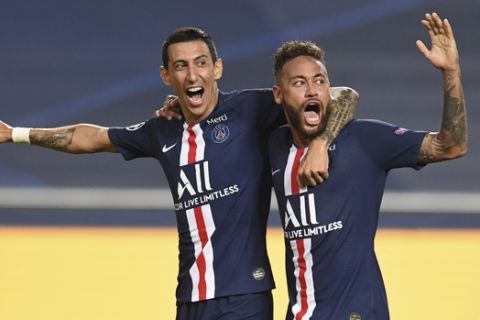 PSG's Angel Di Maria, left, celebrates after scoring his side's second goal with PSG's Neymar during the Champions League semifinal soccer match between RB Leipzig and Paris Saint-Germain at the Luz stadium in Lisbon, Portugal, Tuesday, Aug. 18, 2020. (David Ramos/Pool Photo via AP)