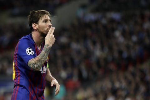 Barcelona forward Lionel Messi celebrates after scoring his side's third goal during the Champions League Group B soccer match between Tottenham Hotspur and Barcelona at Wembley Stadium in London, Wednesday, Oct. 3, 2018. (AP Photo/Kirsty Wigglesworth)