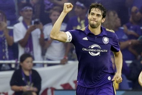 Orlando City's Kaka, left, celebrates his goal against Sporting Kansas City during the first half of an MLS soccer game, Saturday, May 13, 2017, in Orlando, Fla. (AP Photo/John Raoux)
