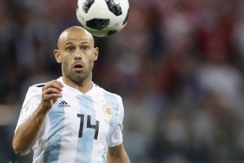 Argentina's Javier Mascherano runs for the ball during the group D match between Argentina and Croatia at the 2018 soccer World Cup in Nizhny Novgorod Stadium in Novgorod, Russia, Thursday, June 21, 2018. (AP Photo/Pavel Golovkin)