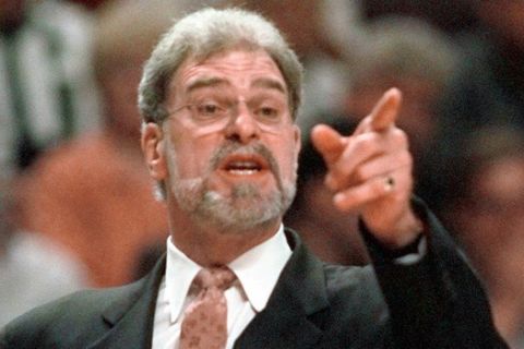 Chicago Bulls head coach Phil Jackson directs the team from the sidelines during the first game of the Eastern Conference Finals Sunday,  May 17, 1998, at the United Center in Chicago. (AP Photo/Michael S. Green)