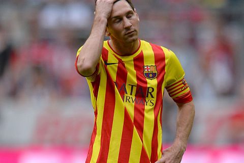 MUNICH, GERMANY - JULY 24:  Lionel Messi of Barcelona reacts during the Uli Hoeness Cup match between FC Bayern Muenchen and FC Barcelona at Allianz Arena on July 24, 2013 in Munich, Germany.  (Photo by Stuart Franklin/Bongarts/Getty Images)