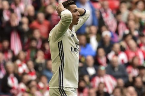 Real Madrid's Cristiano Ronaldo gestures after missing a goal during the Spanish La Liga soccer match between Real Madrid and Athletic Bilbao, at San Mames stadium, in Bilbao, northern Spain, Saturday, March 18, 2017. (AP Photo/Alvaro Barrientos)