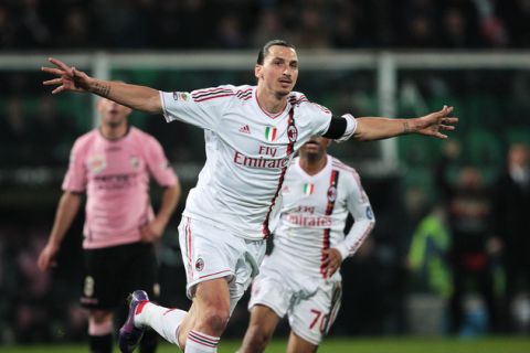 AC Milan's Swedish forward zlatan Ibrahimovic celebrates after scoring during their Italian Serie A football match at Barbera Stadium in Palermo on March 3, 2012.  AFP PHOTO / MARCELLO PATERNOSTRO (Photo credit should read MARCELLO PATERNOSTRO/AFP/Getty Images)