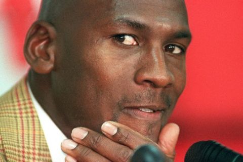 Chicago Bulls Guard Michael Jordan answers questions during a post-game news conference, Friday, March 24, 1995, Chicago, Ill. Orlando defeated the Bulls 106-99. (AP Photo/Roberto Borea)