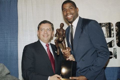 Earvin "Magic" Johnson breaks out in grin as he stands with David Stern, commissioner of the National Basketball Association, Monday, May 18, 1987 at the Forum in Inglewood, Calif., after Johnson was named the NBA's Most Valuable Player for 1986-87 season. Johnson, of the Los Angeles Lakers, has a career-high 23.9 points a game and league-best 12.2 assist record. (AP Photo/Alison Wise)