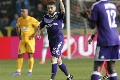 Anderlecht's Nicolae Stanciou celebrates after scores against APOEL during the Europa League round of 16 first leg soccer match between APOEL  and Anderlecht at the GSP stadium in Nicosia, Cyprus, Thursday, March 9, 2017(AP Photos/ Philippos Christou)