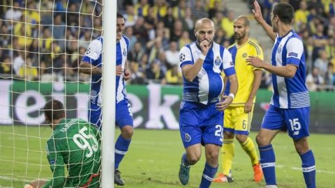 Porto's Portuguese midfielder Andre Andre (C) reacts after scoring during the UEFA Champions League, group G, football match between Maccabi Tel Aviv and FC Porto at the Sammy Ofer Stadium, in the Israeli coastal city of Haifa, on November 04, 2015. AFP PHOTO / JACK GUEZ        (Photo credit should read JACK GUEZ/AFP/Getty Images)