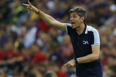 FILE - In this May 27, 2017 file photo, Alaves' coach Mauricio Pellegrino signals during the Copa del Rey final soccer match between Barcelona and Alaves at the Vicente Calderon stadium in Madrid, Spain.Spanish club Leganes has hired Argentine coach Mauricio Pellegrino for next season. Pellegrino replaces Asier Garitano, who was hired by Real Sociedad last week. (AP Photo/Francisco Seco)