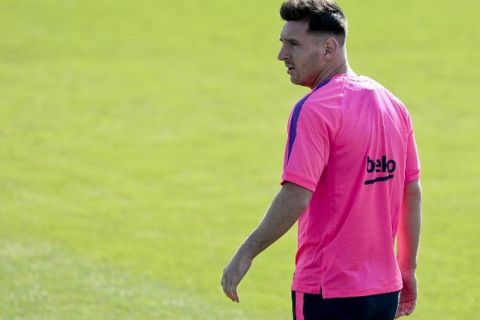 Barcelona's Argentinian forward Lionel Messi takes part in a training session at the Sports Center FC Barcelona Joan Gamper in Sant Joan Despi, near Barcelona on August 5, 2014. AFP PHOTO/ JOSEP LAGO