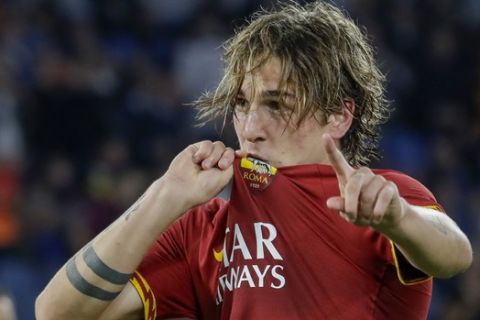 Roma's Nicolo Zaniolo celebrates after he scored his side's second goal during a Serie A soccer match between Roma and AC Milan, at Rome's Olympic Stadium, Sunday, Oct. 27, 2019. (AP Photo/Andrew Medichini)