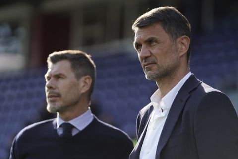FILE -- In this Jan. 11, 2020 file photo, Paolo Maldini, right, and Zvonimir Boban look on during an Italian Serie A soccer match between Cagliari and Milan in Cagliari, Italy. AC Milan announced Saturday that Zvonimir Boban, its chief football officer, has been fired. The move comes following an interview that Boban gave to the Gazzetta dello Sport in which he questioned the direction of the club under the U.S.-based hedge fund Elliott. (Spada/LaPresse via AP)