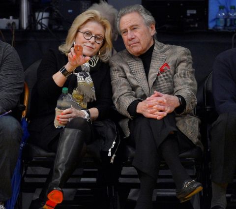 AEG founder Philip Anschutz, right, and his wife Nancy watch the Los Angeles Lakers play the Golden State Warriors during the first half of an NBA basketball game, Friday, Nov. 22, 2013, in Los Angeles. (AP Photo/Mark J. Terrill) 