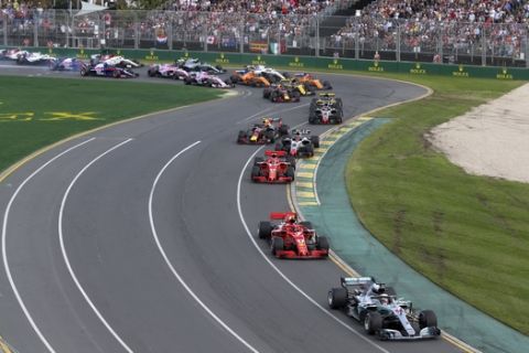 Mercedes driver Lewis Hamilton of Britain leads the field at the start of the Australian Formula One Grand Prix in Melbourne, Australia, Sunday, March 25, 2018. (AP Photo/Rick Rycroft)