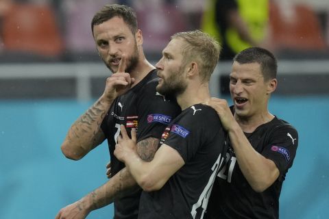 Οι παίκτες της Αυστρίας πανηγυρίζουν γκολ κόντρα στη Βόρεια Μακεδονία για το Euro 2020.