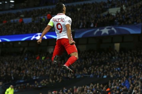 Monaco's Radamel Falcao celebrates after scoring his side's first goal during the Champions League round of 16 first leg soccer match between Manchester City and Monaco at the Etihad Stadium in Manchester, England, Tuesday Feb. 21, 2017. (AP Photo/Dave Thompson)
