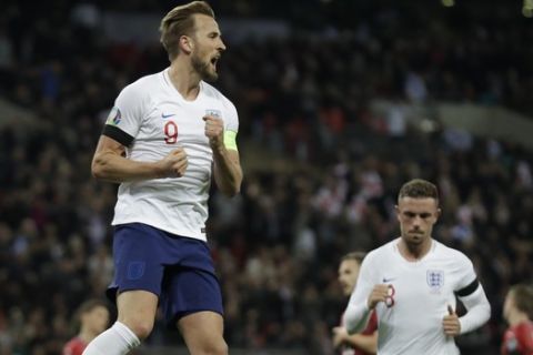 England's Harry Kane celebrates his sides second goal during the Euro 2020 group a qualifying soccer match between England and the Czech Republic at Wembley stadium in London, Friday March 22, 2019. (AP Photo/Matt Dunham)