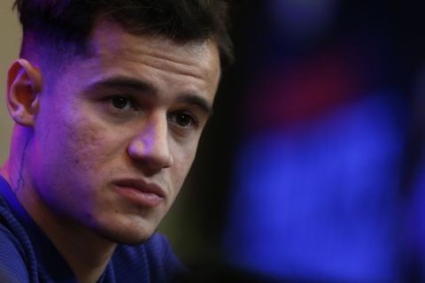 Barcelona's new signing Brazilian Philippe Coutinho attends his official presentation at the Camp Nou stadium in Barcelona, Spain, Monday, Jan. 8, 2018. Coutinho is joining Barcelona after Liverpool agreed Saturday to sell the Brazilian in a deal that makes him one of the most expensive players in soccer history. (AP Photo/Manu Fernandez)