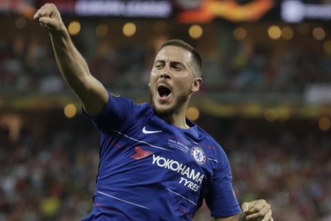 Chelsea's Eden Hazard celebrates after scoring his side's fourth goal during the Europa League Final soccer match between Arsenal and Chelsea at the Olympic stadium in Baku, Azerbaijan, Wednesday, May 29, 2019. (AP Photo/Luca Bruno)