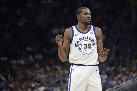Golden State Warriors forward Kevin Durant (35) argues with an official during the second half of an NBA basketball game against the Orlando Magic Friday, Dec. 1, 2017, in Orlando, Fla. The Warriors won 133-112. (AP Photo/Phelan M. Ebenhack)