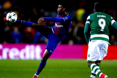 Barcelona's Nelson Semedo kicks the ball during the Champions League Group D soccer match between FC Barcelona and Sporting CP at the Camp Nou stadium in Barcelona, Spain, Tuesday, Dec. 5, 2017. (AP Photo/Manu Fernandez)