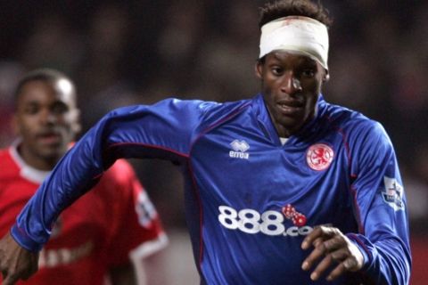 Middlesbrough's Ugo Ehiogu runs with the ball during their English FA Cup sixth round soccer match against Charlton Athletic at the Valley stadium, London, Thursday March 23, 2006. (AP Photo/Tom Hevezi)