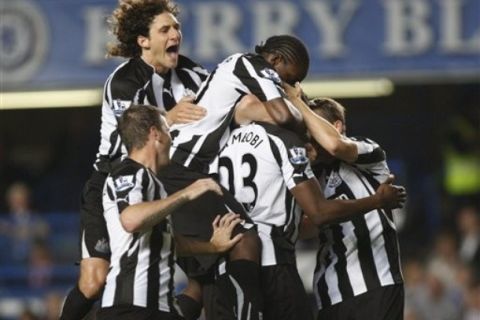 Newcastle United's players celebrates their third goal against Chelsea during their English League Cup third round soccer match at Stamford Bridge, London, Wednesday, Sept. 22, 2010. (AP Photo/Sang Tan) ** NO INTERNET/MOBILE USAGE WITHOUT FOOTBALL ASSOCIATION PREMIER LEAGUE (FAPL) LICENCE - CALL +44 (0)20 7864 9121 or EMAIL info@football-dataco.com FOR DETAILS **