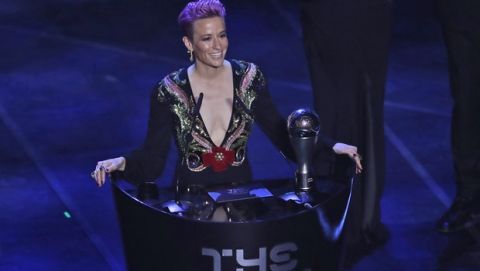 United States forward Megan Rapinoe receives the Best FIFA Women's player award during the ceremony of the Best FIFA Football Awards, in Milan's La Scala theater, northern Italy, Monday, Sept. 23, 2019. (AP Photo/Antonio Calanni)