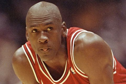 Chicago Bulls Michael Jordan takes a break during action against the Los Angeles Lakers in Game 3 of the NBA finals at the Forum in Inglewood, Calif., June 7, 1991.  (AP Photo/Craig Fuji)