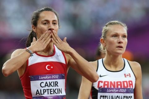 LONDON, ENGLAND - AUGUST 08:  Asli Cakir Alptekin of Turkey celebrates after competing in the Women's 1500m Semifinals on Day 12 of the London 2012 Olympic Games at Olympic Stadium on August 8, 2012 in London, England.  (Photo by Streeter Lecka/Getty Images)
