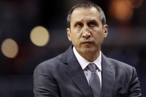 Cleveland Cavaliers head coach David Blatt stands in the bench area in the first half of an NBA basketball game against the Washington Wizards, Wednesday, Jan. 6, 2016, in Washington. (AP Photo/Alex Brandon)