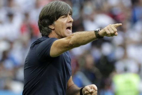 Germany head coach Joachim Loew shouts during the group F match between South Korea and Germany, at the 2018 soccer World Cup in the Kazan Arena in Kazan, Russia, Wednesday, June 27, 2018. (AP Photo/Lee Jin-man)