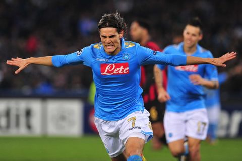 Napoli's Huruguayan forward Edinson Roberto Cavani celebrates his second goal during the Champions League group A  football match SSC Napoli vs Manchester City on November 22, 2011 at the San Paolo stadium in Naples . AFP PHOTO / ALBERTO PIZZOLI (Photo credit should read ALBERTO PIZZOLI/AFP/Getty Images)
