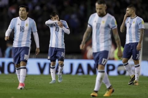 Argentinean players leave the field at the half time during a 2018 World Cup qualifying soccer match against Venezuela in Buenos Aires, Argentina, Tuesday, Sept. 5, 2017. (AP Photo/Victor R. Caivano)