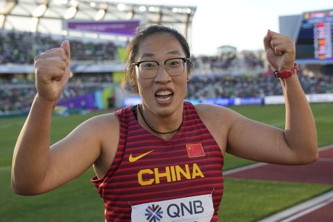 Gold medalist Bin Feng, of China, celebrates after the final of the women's discus throw at the World Athletics Championships on Wednesday, July 20, 2022, in Eugene, Ore.(AP Photo/David J. Phillip)