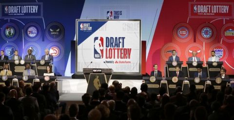 NBA team representatives participating in the NBA basketball draft lottery sit on stage Tuesday, May 15, 2018, in Chicago. (AP Photo/Charles Rex Arbogast)