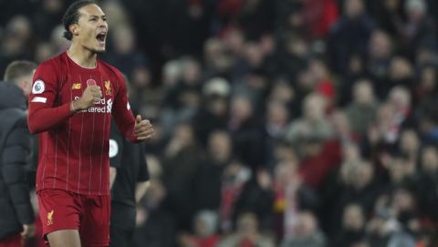 Liverpool's Virgil van Dijk celebrates at the end of the English Premier League soccer match between Liverpool and Manchester City at Anfield stadium in Liverpool, England, Sunday, Nov. 10, 2019. Liverpool won 3-1. (AP Photo/Jon Super)