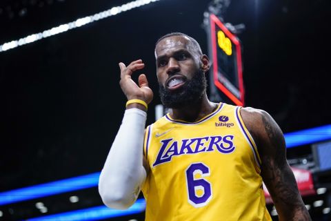 Los Angeles Lakers' LeBron James (6) gestures after making a shot during the first half of an NBA basketball game against the Brooklyn Nets Tuesday, Jan. 25, 2022 in New York. (AP Photo/Frank Franklin II)