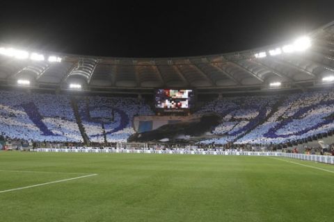 A view of Lazio fans choreography prior to the start of an Italian Serie A soccer match between AS Roma and Lazio, at the Olympic stadium in Rome, Sunday, April 15, 2018. (AP Photo/Gregorio Borgia)