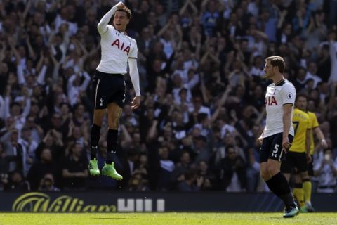 Tottenham's Dele Alli, left, celebrates after scoring a goal during the English Premier League soccer match between Tottenham Hotspur and Watford at White Hart Lane in London, Saturday April 8, 2017. (AP Photo/Tim Ireland)