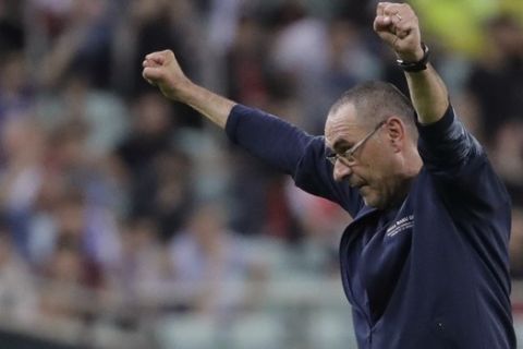 FILE - In this file photo taken on May 29, 2019, then Chelsea head coach Maurizio Sarri celebrates after winning the Europa League Final soccer match against Arsenal at the Olympic stadium in Baku, Azerbaijan. There will be some familiar new faces when the Italian league starts back up this weekend _ albeit in unfamiliar roles. Maurizio Sarri and Antonio Conte have returned to coach in Serie A in a shakeup of the top managerial roles rarely seen. (AP Photo/Luca Bruno)