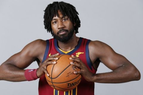Cleveland Cavaliers' John Holland (10) poses for a portrait during the NBA basketball team's media day, Monday, Sept. 24, 2018, in Independence, Ohio. (AP Photo/Ron Schwane)