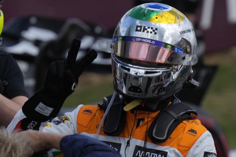 McLaren driver Lando Norris of Britain celebrates his second place at the British Formula One Grand Prix race at the Silverstone racetrack, Silverstone, England, Sunday, July 9, 2023. (AP Photo/Luca Bruno)