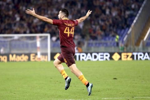 Roma¢s Kostas Manolas celebrates after scoring during a Serie A soccer match between Roma and Inter Milan, at Rome's Olympic Stadium, Sunday, Oct. 2, 2016. (AP Photo/Andrew Medichini)